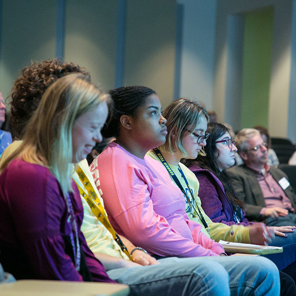 students listen during a class session