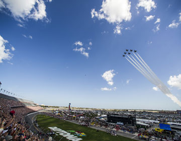 the Daytona speedway with jets fying above