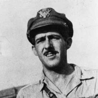 Black and white cropped headshot of Thomas McGuire wearing an Air Force cap