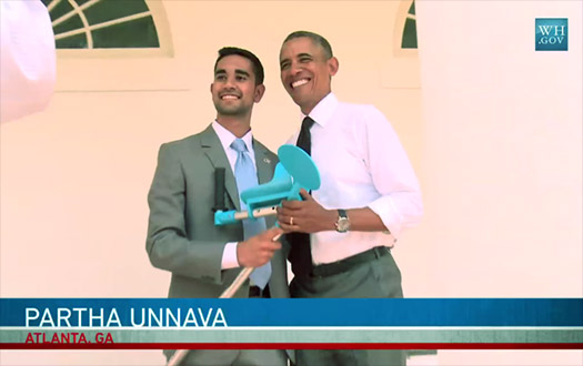 Partha Unnava with President Barack Obama during the White House Maker Faire, holding a Better Walk crutch