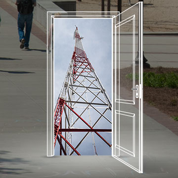 graphic - drawing of open door with photo of tower inside
