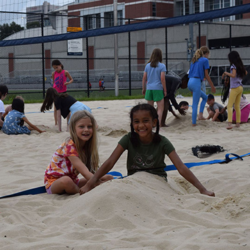 Tech Wreck campers playing in the sand.