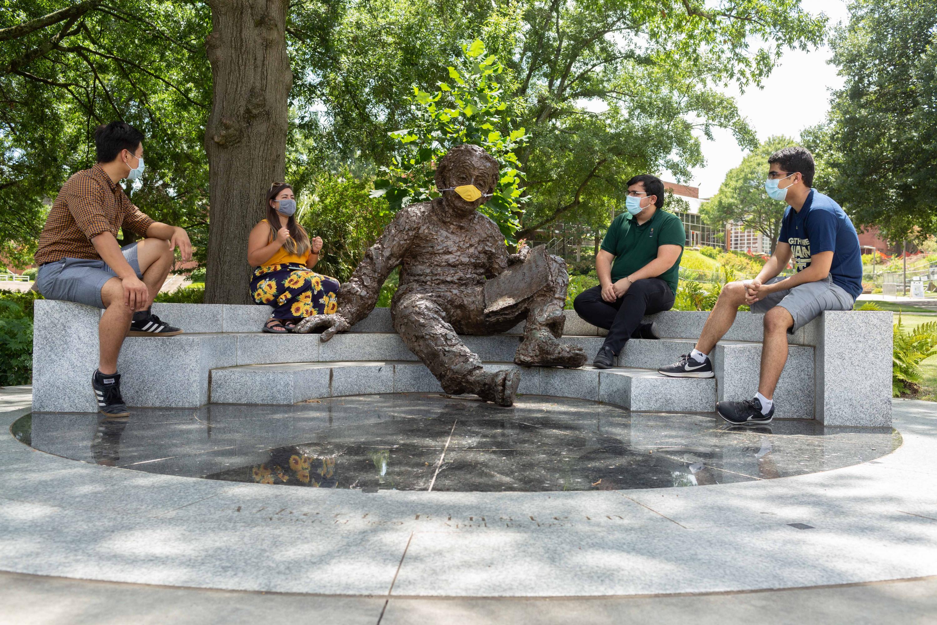 Students gathered around the Einstein statue on Georgia Tech’s campus in Atlanta. (Photo: Allison Carter)