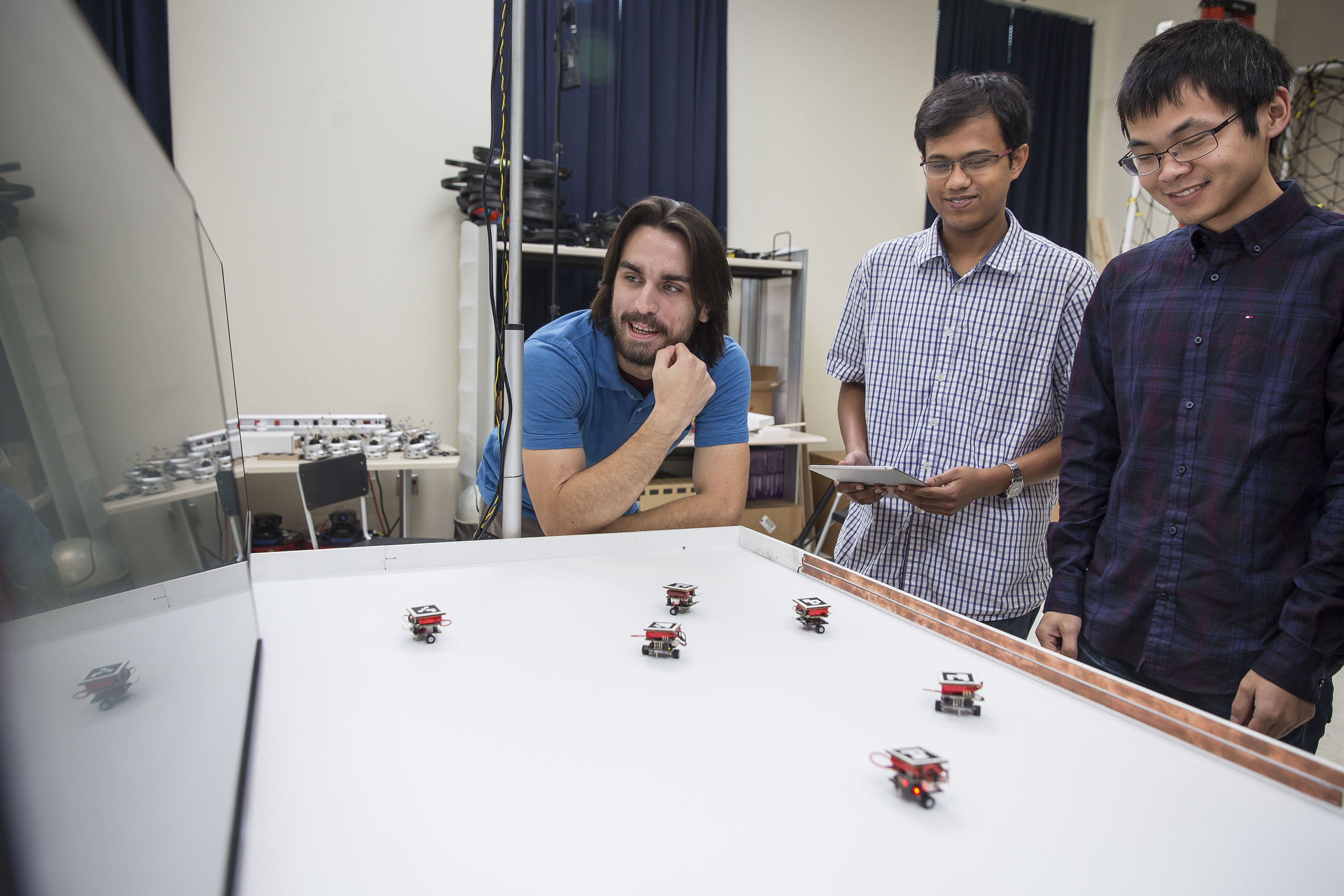 Students used the mini-version of the Robotarium (seen here) in a test session in the fall of 2015 (photo by Raftermen Photography). 