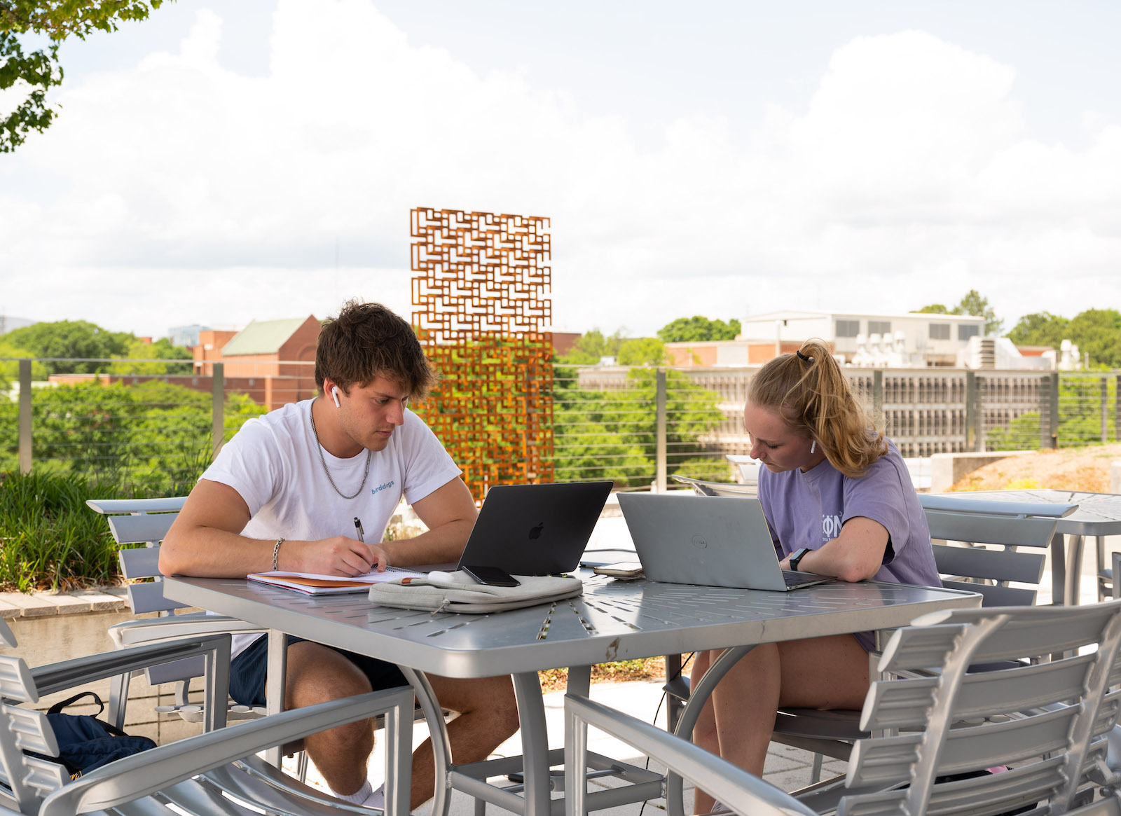 Truman Yardley and Lauren Harris on the roof of Clough Undergraduate Learning Commons.