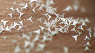 STAR particles are mixed into a therapeutic cream or gel and applied to the skin, painlessly creating micropores in the skin’s surface that dramatically – but temporarily – increase skin permeability to drugs. (Credit: Georgia Tech)
