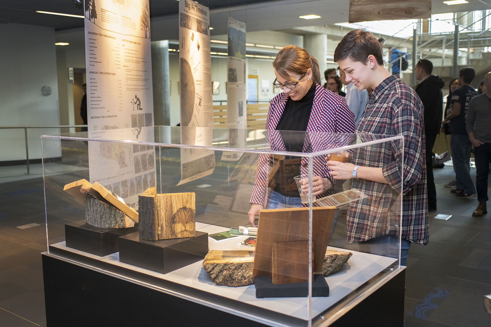 attendees enjoy the Fall of a Champion exhibit