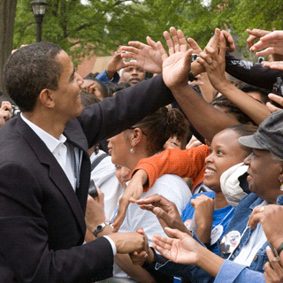 Presidential candidate Barack Obama shakes hands with constituents at a Georgia Tech rally.