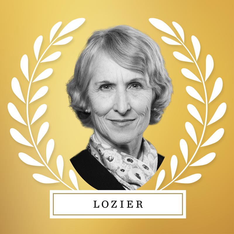 Portrait of Susan Lozier with laurel leaves