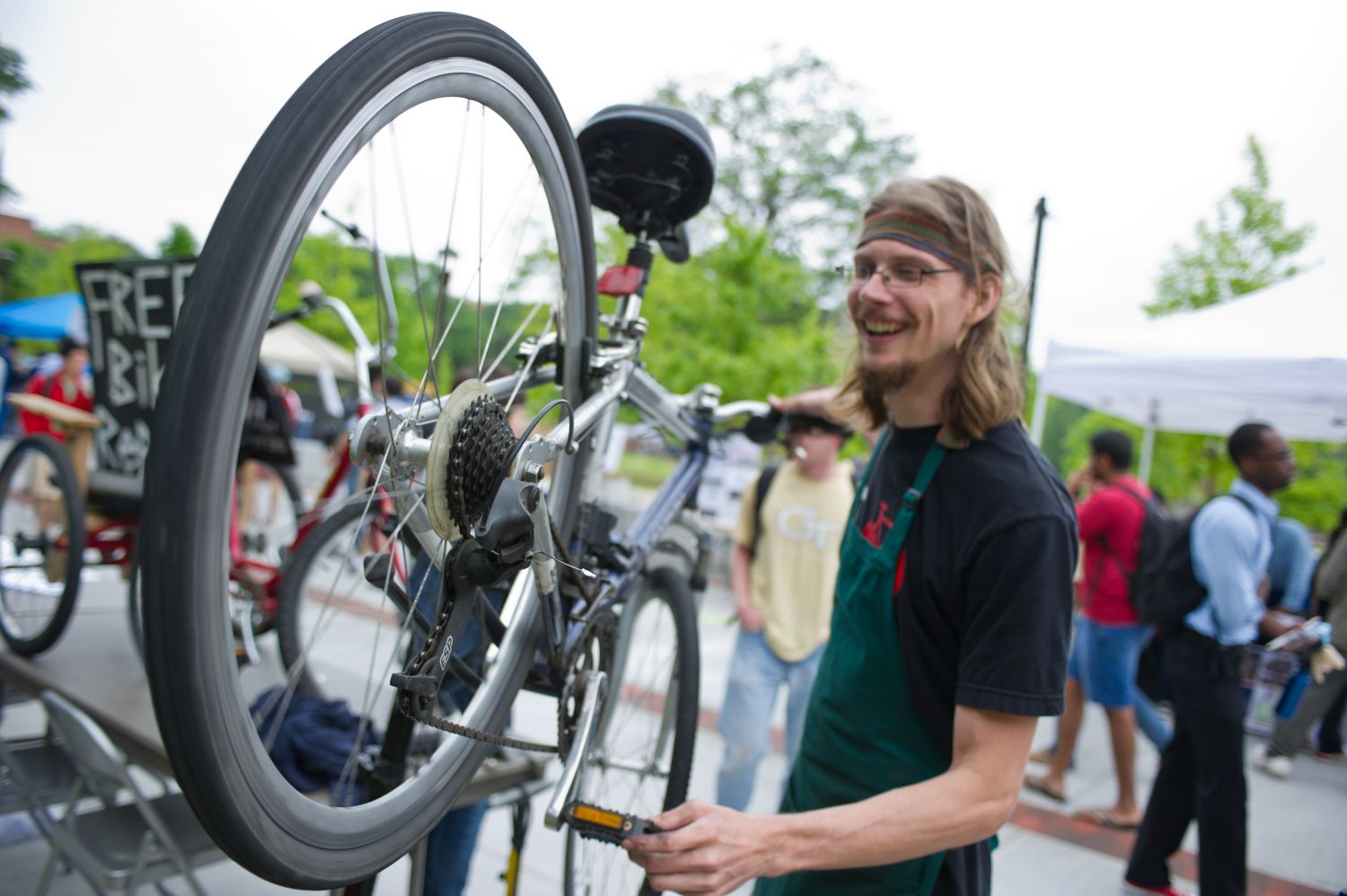 Students from the BIIC offer free bike repairs during BIke Week