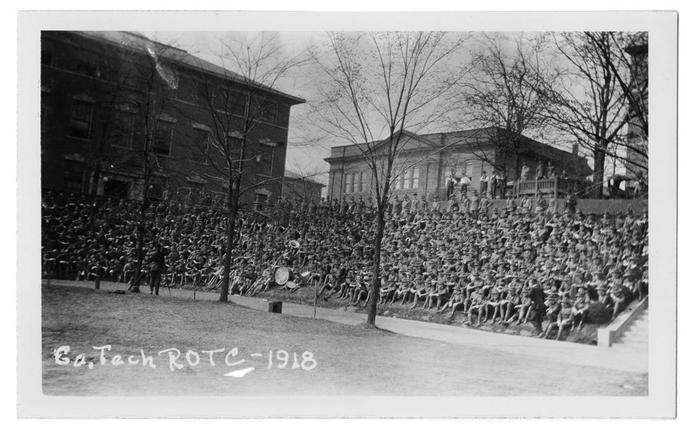 Photo from 1918 showing a crowd of ROTC men gathered on the hill near Tech Tower