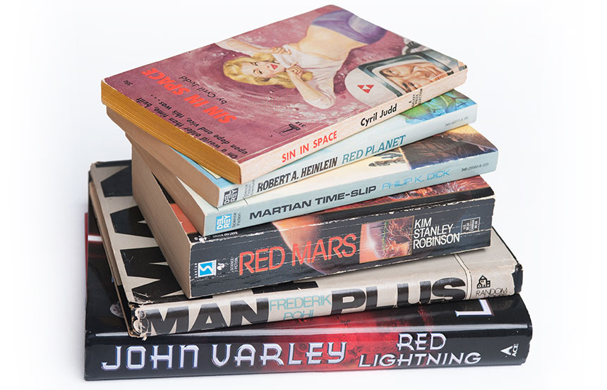 photo - stack of vintage paperback science fiction books