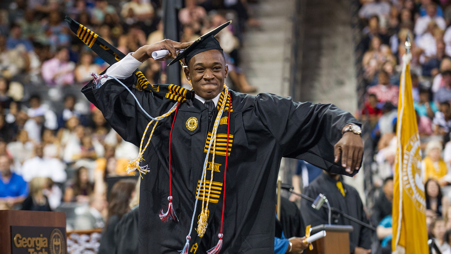 young man with diploma