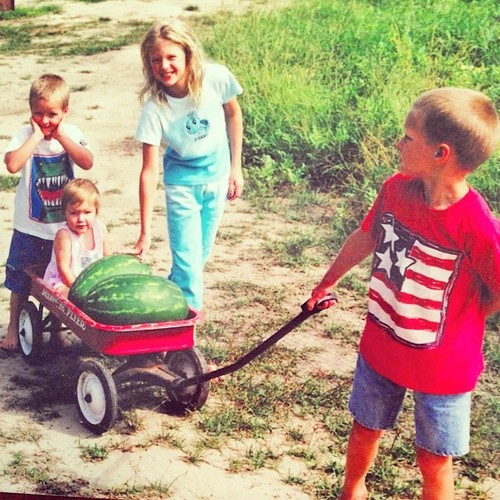 Bridges (pictured here as a child in the blue pants) was raised on a farm. She says farm life and her family sparked her love of science. 