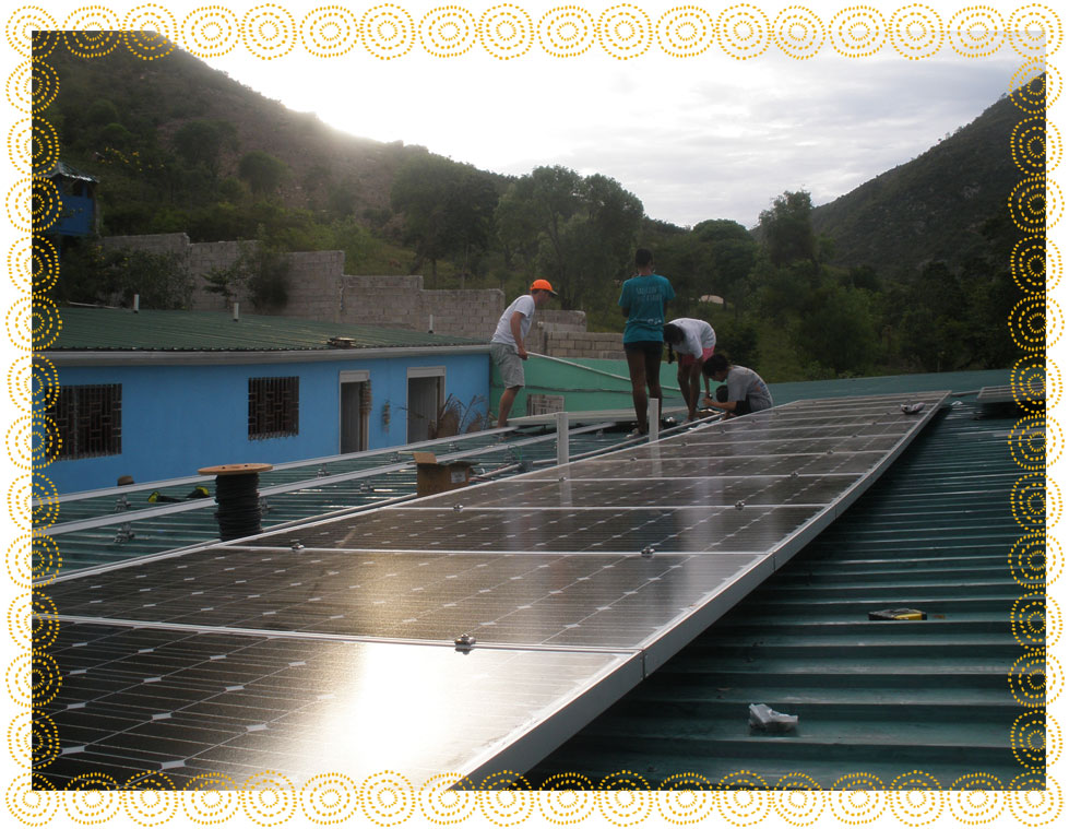 Installing solar panels on the roof of the clinic