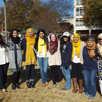 photo - women students of different ethnicities standing together
