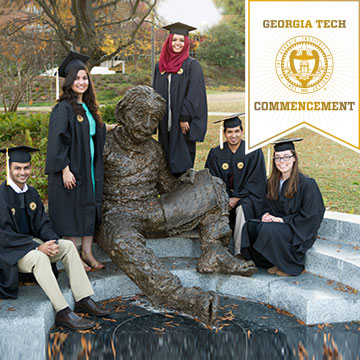photo - group of students sitting on Einstein statue steps