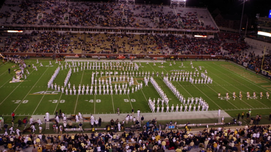 The interlocking G and T logo of Georgia Tech is one of the formations the band makes on the field 