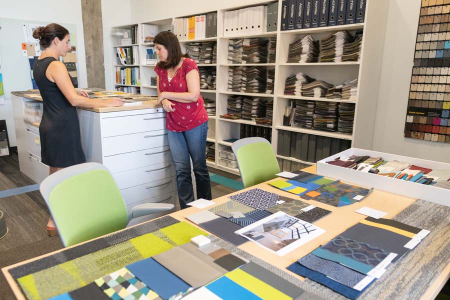 Although interior designers don’t work on the same projects, they often collaborate and exchange ideas. The designers review building codes, including ADA and life safety, and health and welfare.