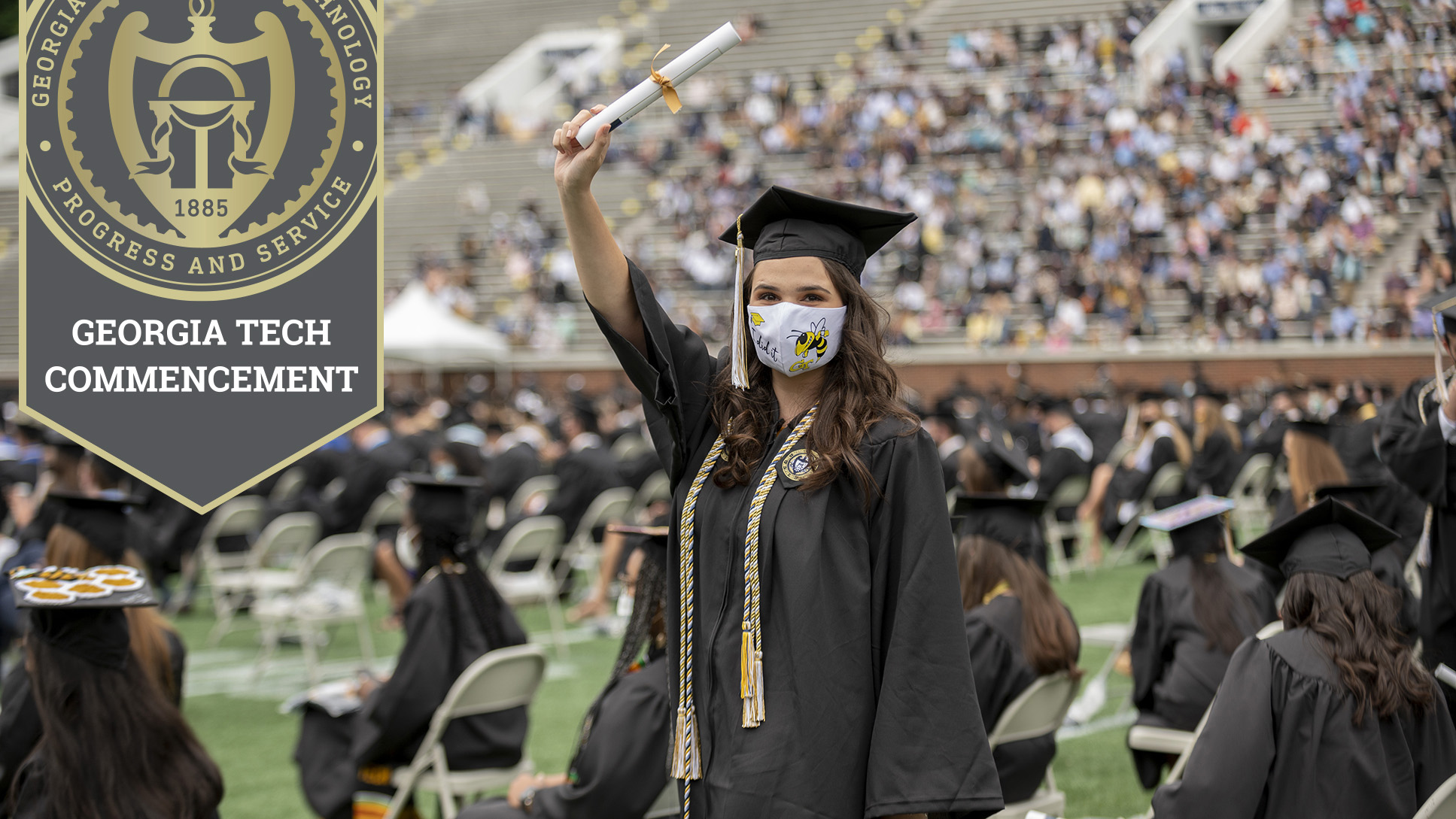 A graduate celebrates at Spring 2021 Commencement