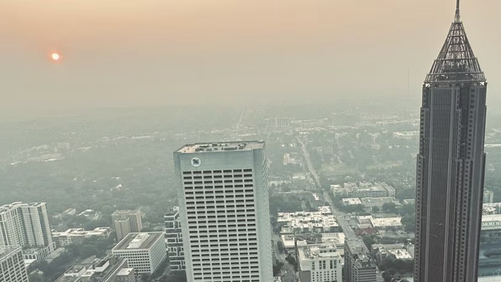 Hazy conditions seen around Atlanta due to Canadian wildfires. Orange hazy smoke seen against Atlanta skyline.