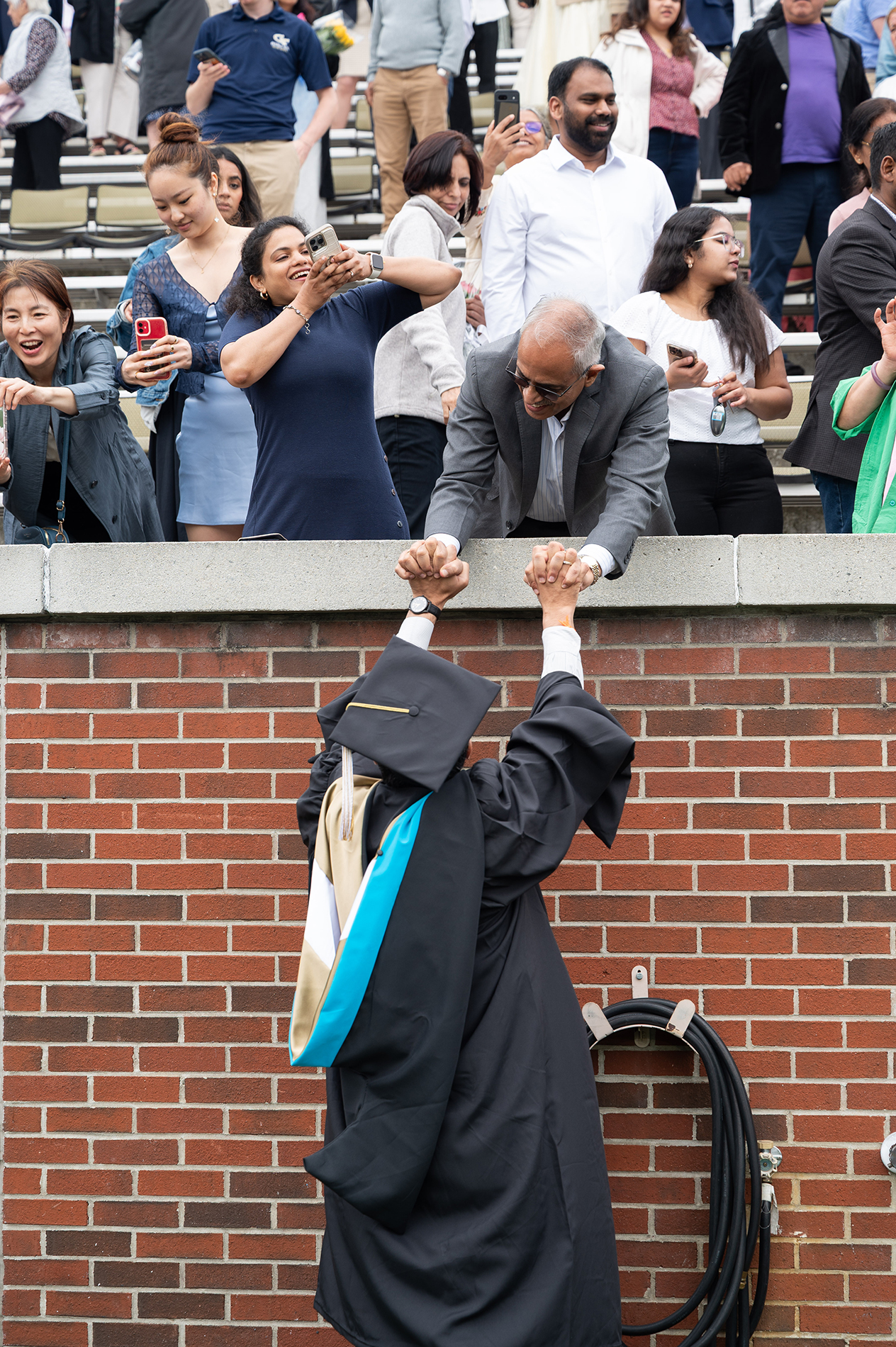 master's graduate at commencement