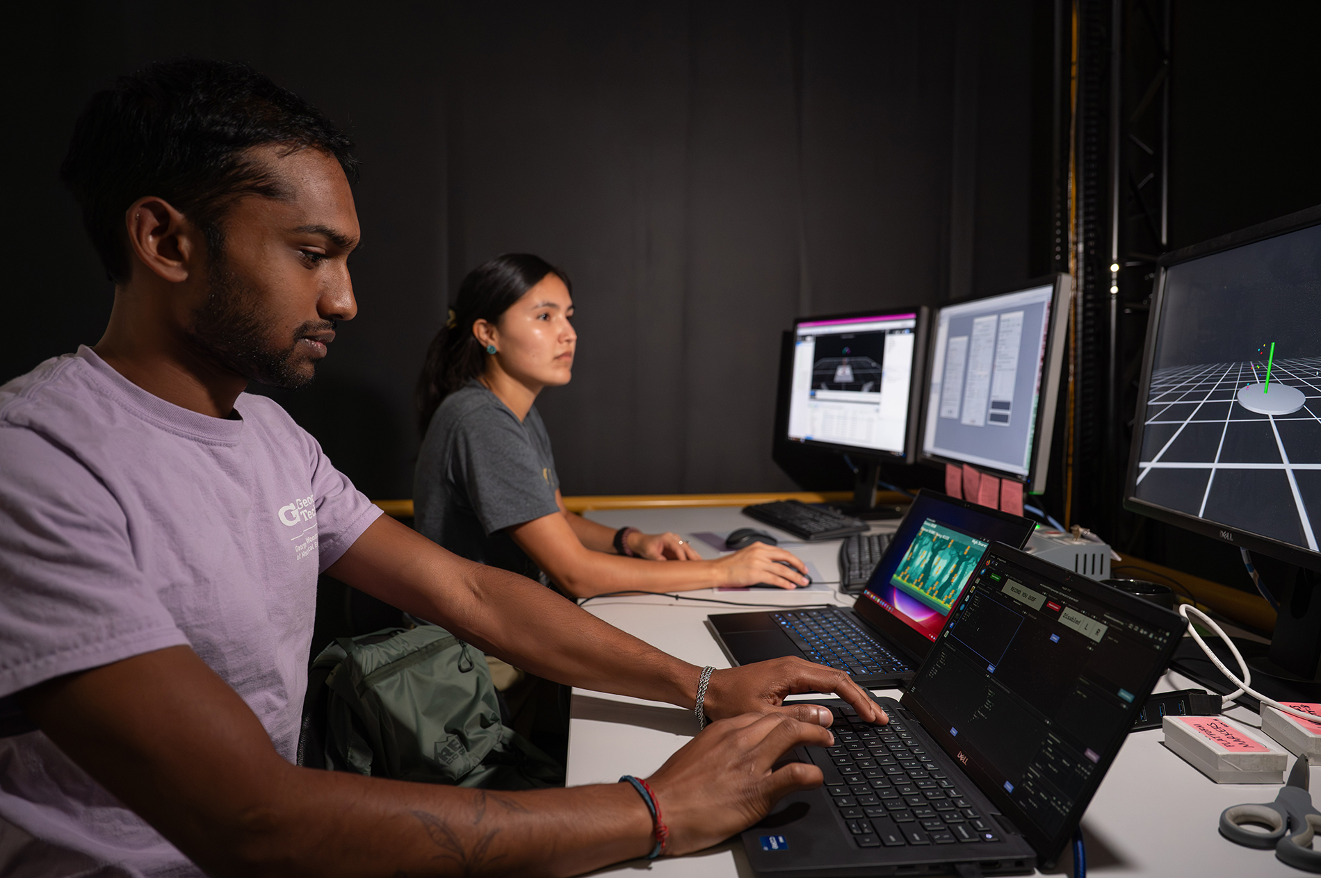 researchers in exoskeleton lab