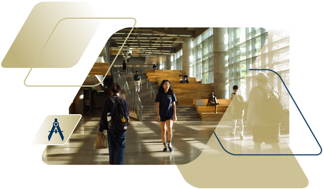 students walking through Clough building with light streaming in the windows
