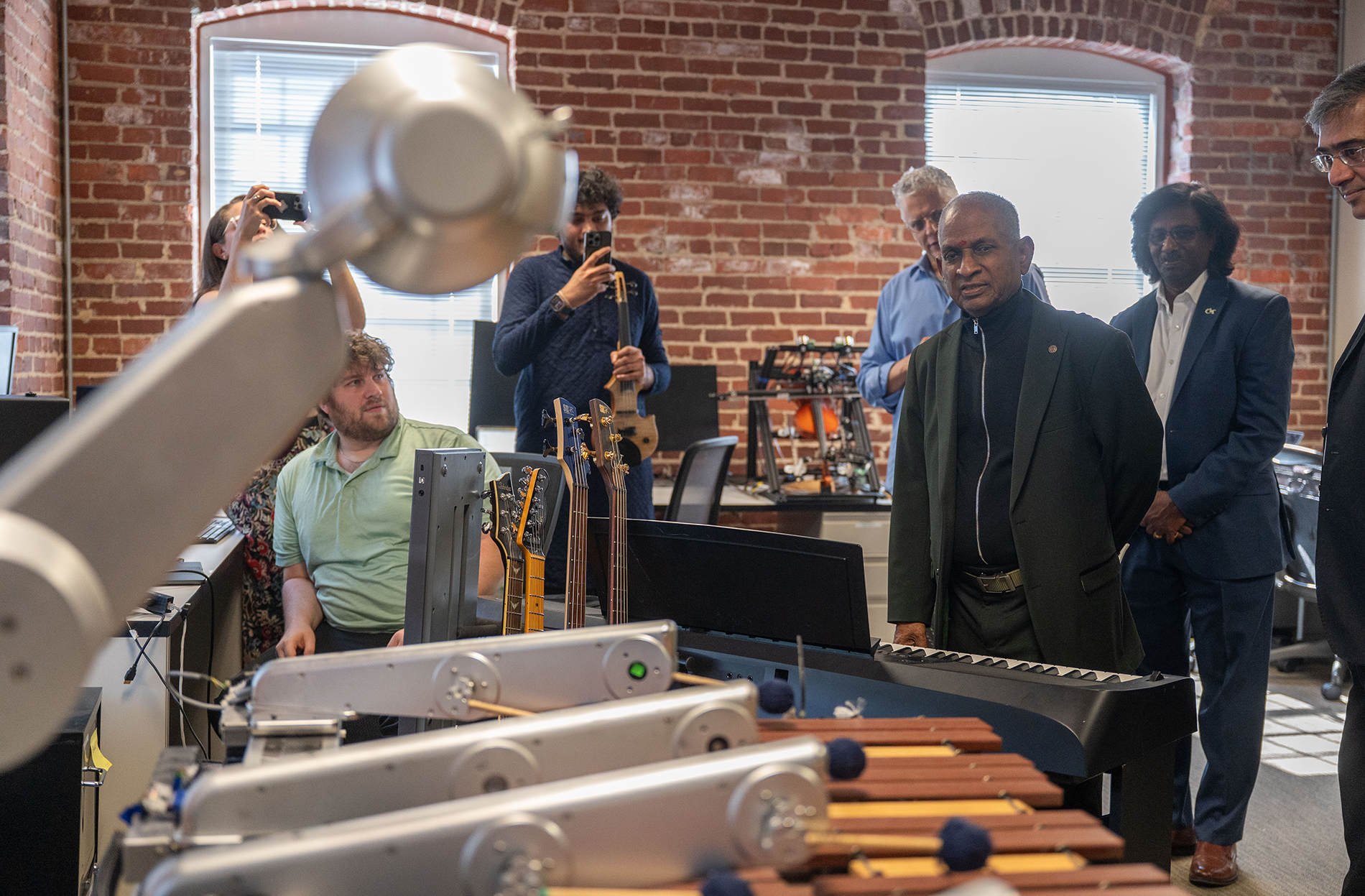 Dr. Ilaiyaraaja visits Georgia Tech and watches demonstrations of the Institute's music technology innovations.
