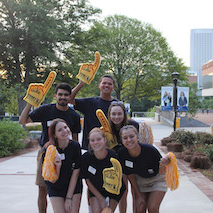 FASET leaders with giant foam fingers
