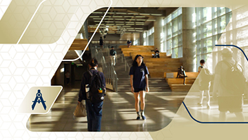 students walking through Clough building with light streaming in the windows