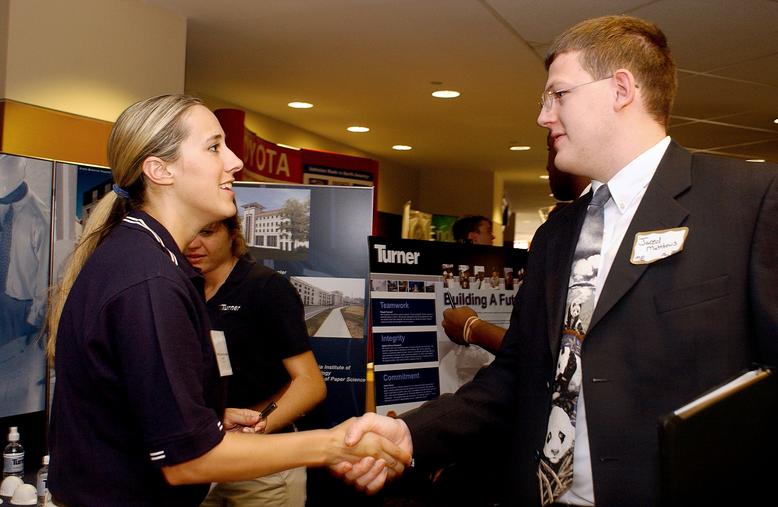 Well-prepared student interacts with a recruiter at the Georgia Tech Career Fair. 