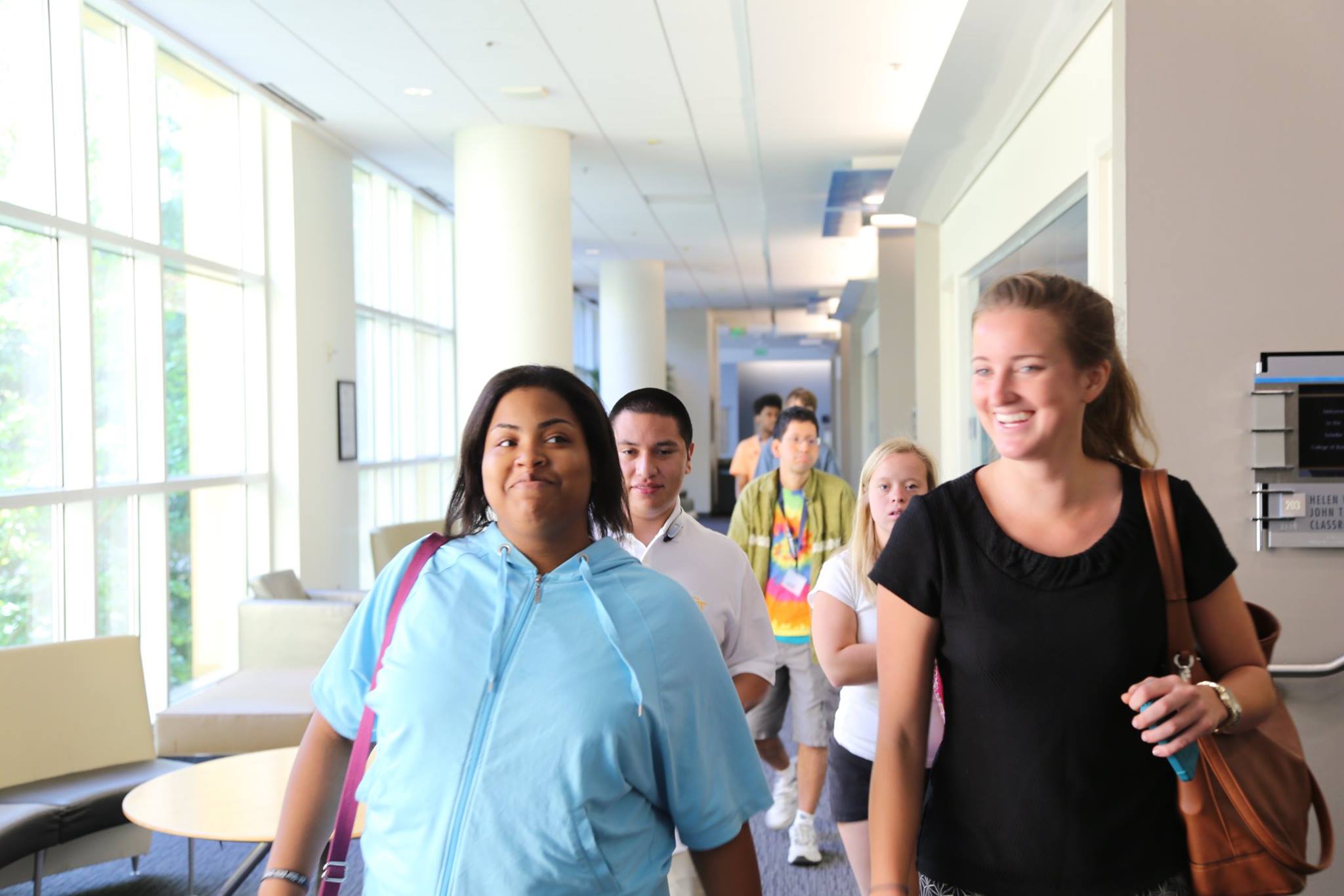 Natalie Jackson (left) and Marnie Williams, followed by other Excel students, make their way to the Institute for Leadership and Entrepreneurship, Excel’s home on the fourth floor of the Scheller College of Business.