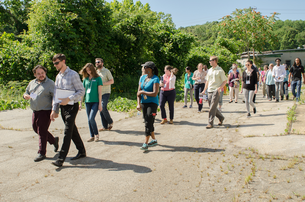 Participants in the Paths to Social Sustainability conference tour the Emerald Corridor, a seven-mile stretch of the Atlanta BeltLine abutting Proctor Creek, located west of the Georgia Tech campus. 