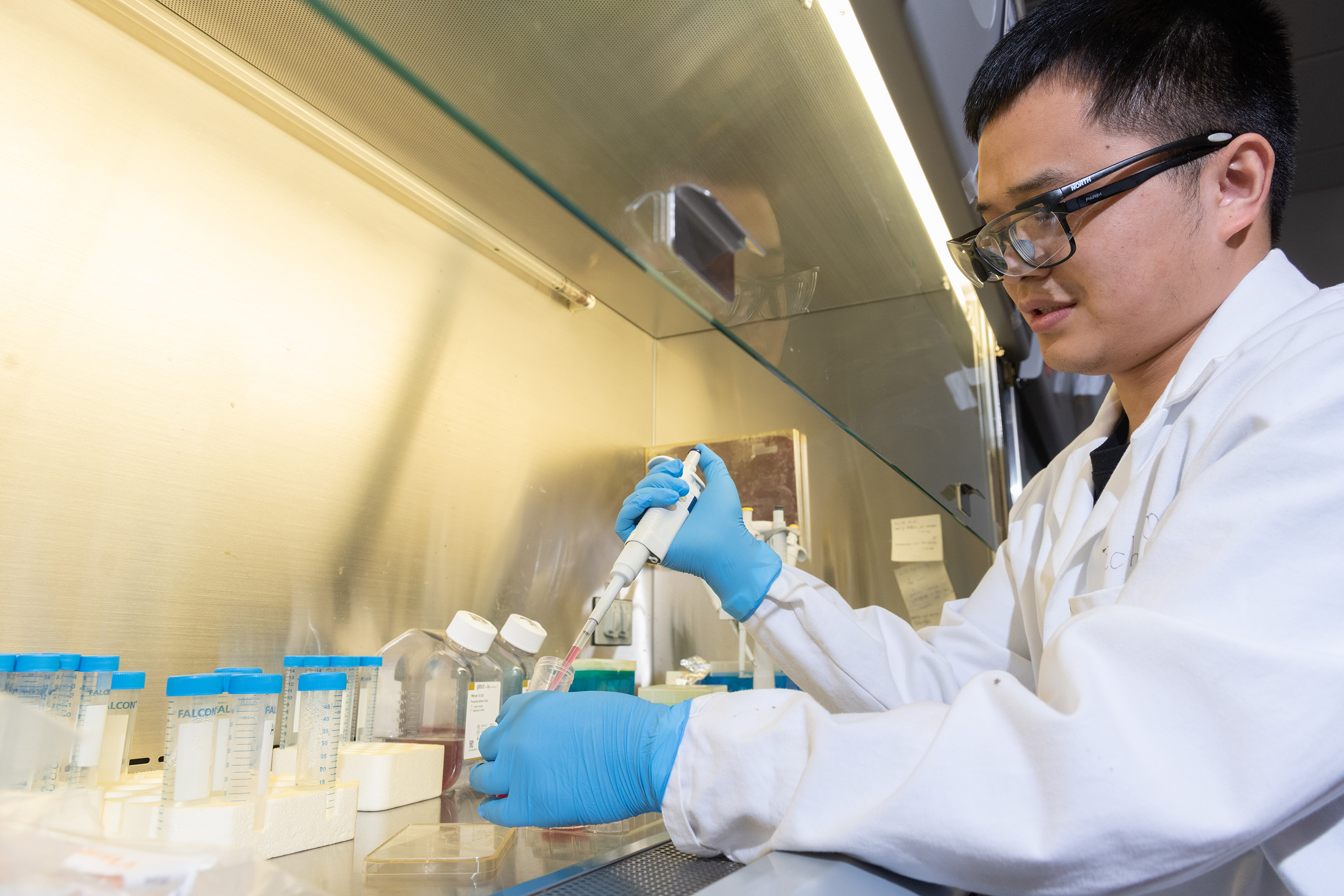 Jichuan Qiu, a postdoctoral fellow at Georgia Tech, researches how nanoscale materials could be used in medical treatments. (Credit: Allison Carter)