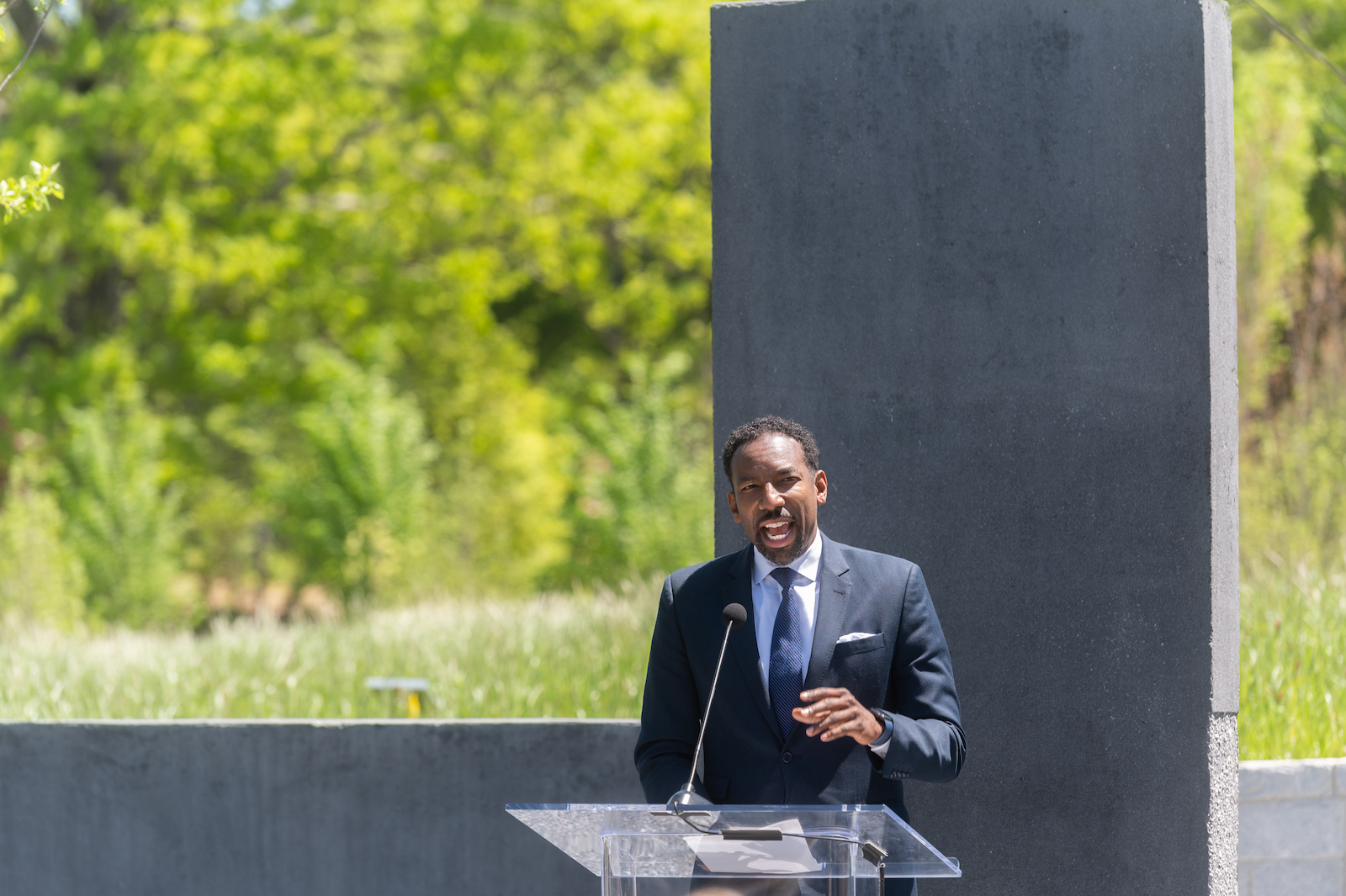 Andre Dickens, Atlanta city council member who also serves on the Georgia Tech Alumni Association board of trustees, speaks about the historical significance of events that took place at the EcoCommons site at an event in April 2021. Photo by Allison Carter.