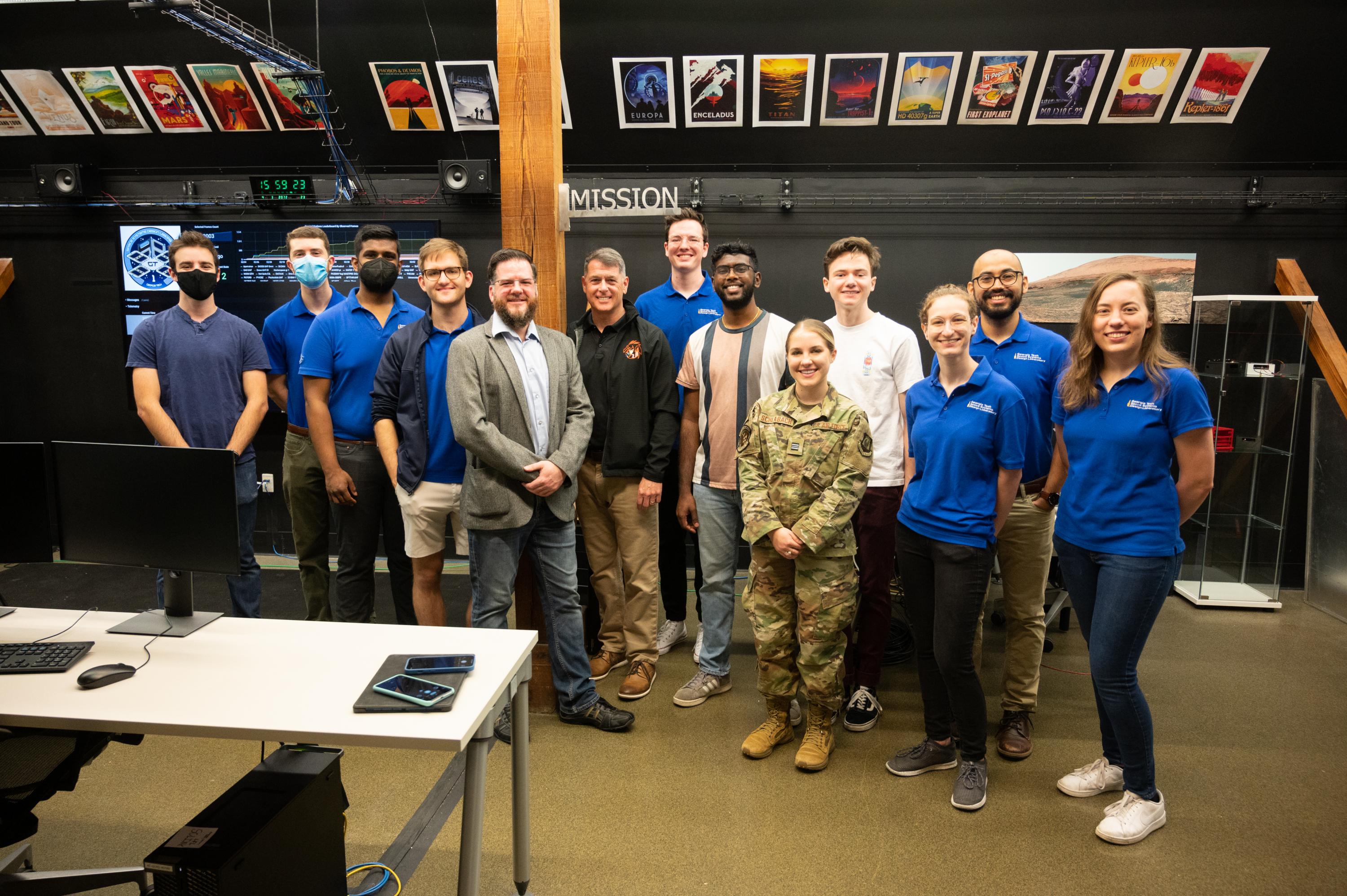 Shane Kimbrough with members of the Space Systems Design Lab. 