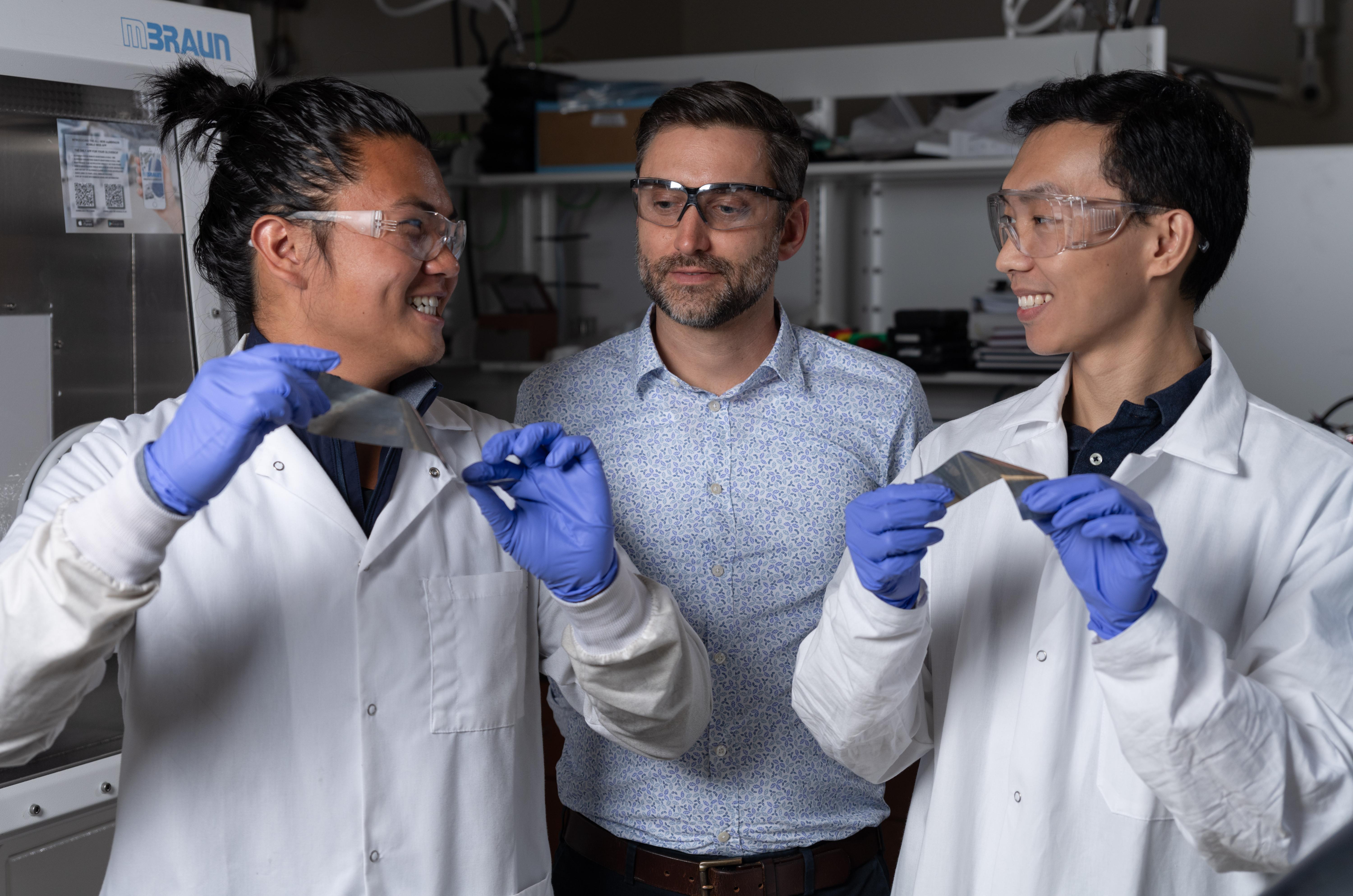 Ph.D. student Yuhgene Liu, associate professor Matthew McDowell, and postdoctoral researcher Congcheng Wang in McDowell's lab at Georgia Tech.
