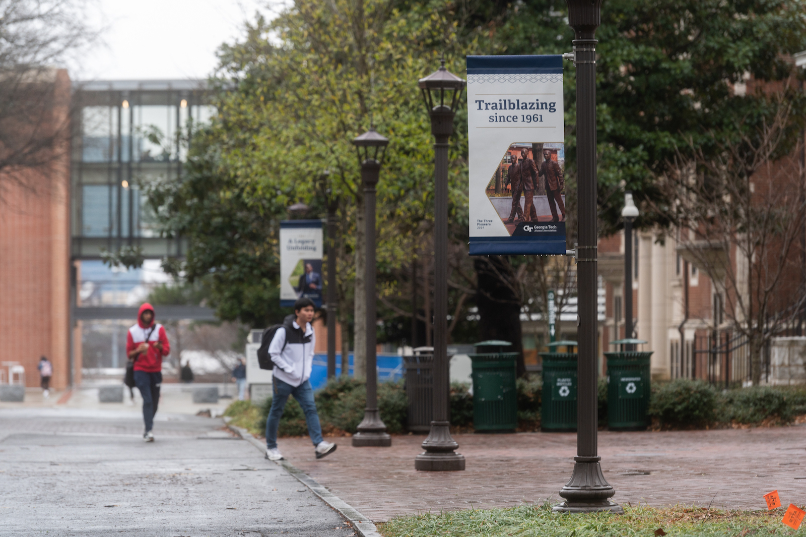 The four-banner series highlights past, present, and future Georgia Tech trailblazers. A total of 24 banners are affixed to light poles across campus and will be on display through the end of May. (Photo by Allison Carter)