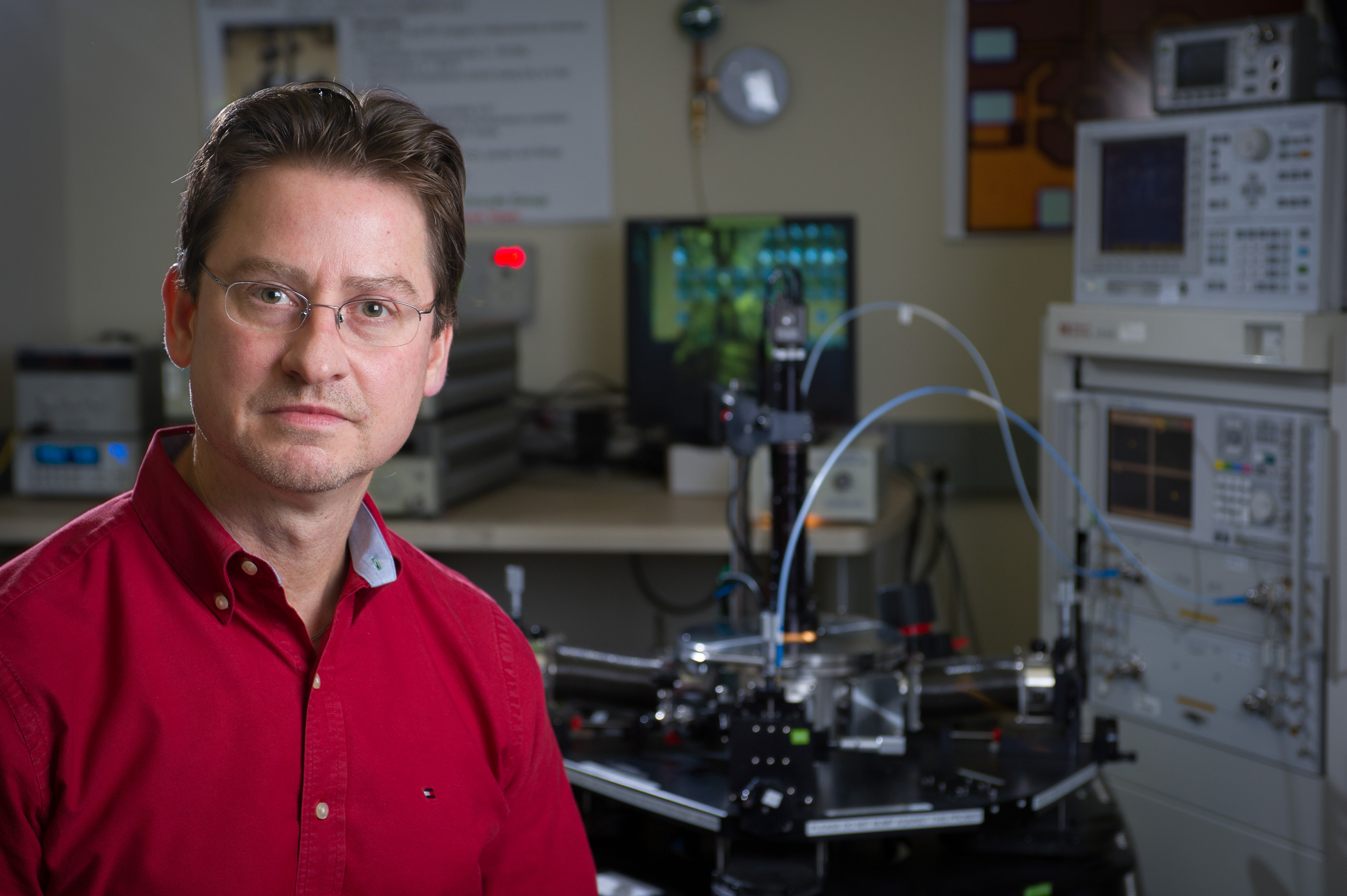 Professor John Cressler led a Georgia Tech team that recently demonstrated the world's fastest silicon-based device to date, in collaboration with IHP-Innovations for High Performance Microelectronics in Germany. The investigators operated a silicon-germanium (SiGe) transistor at 798 gigahertz (GHz) fMAX, exceeding the previous speed record for silicon-germanium chips by about 200 GHz. (Georgia Tech Photo: Rob Felt)