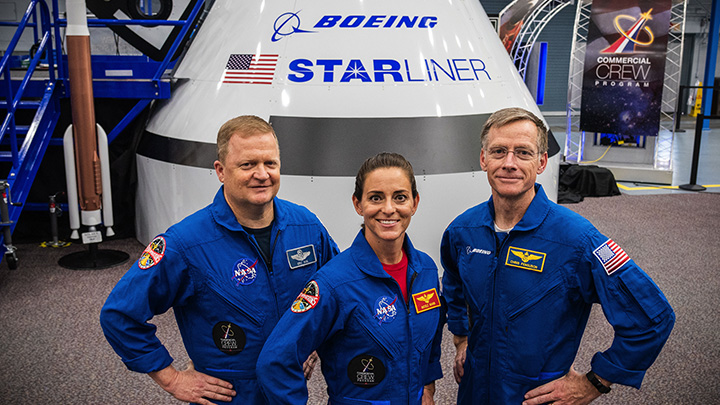 Eric Boe (left) will fly with Nicole Mann and Chris Ferguson in the Starliner capsule sometime in 2019 