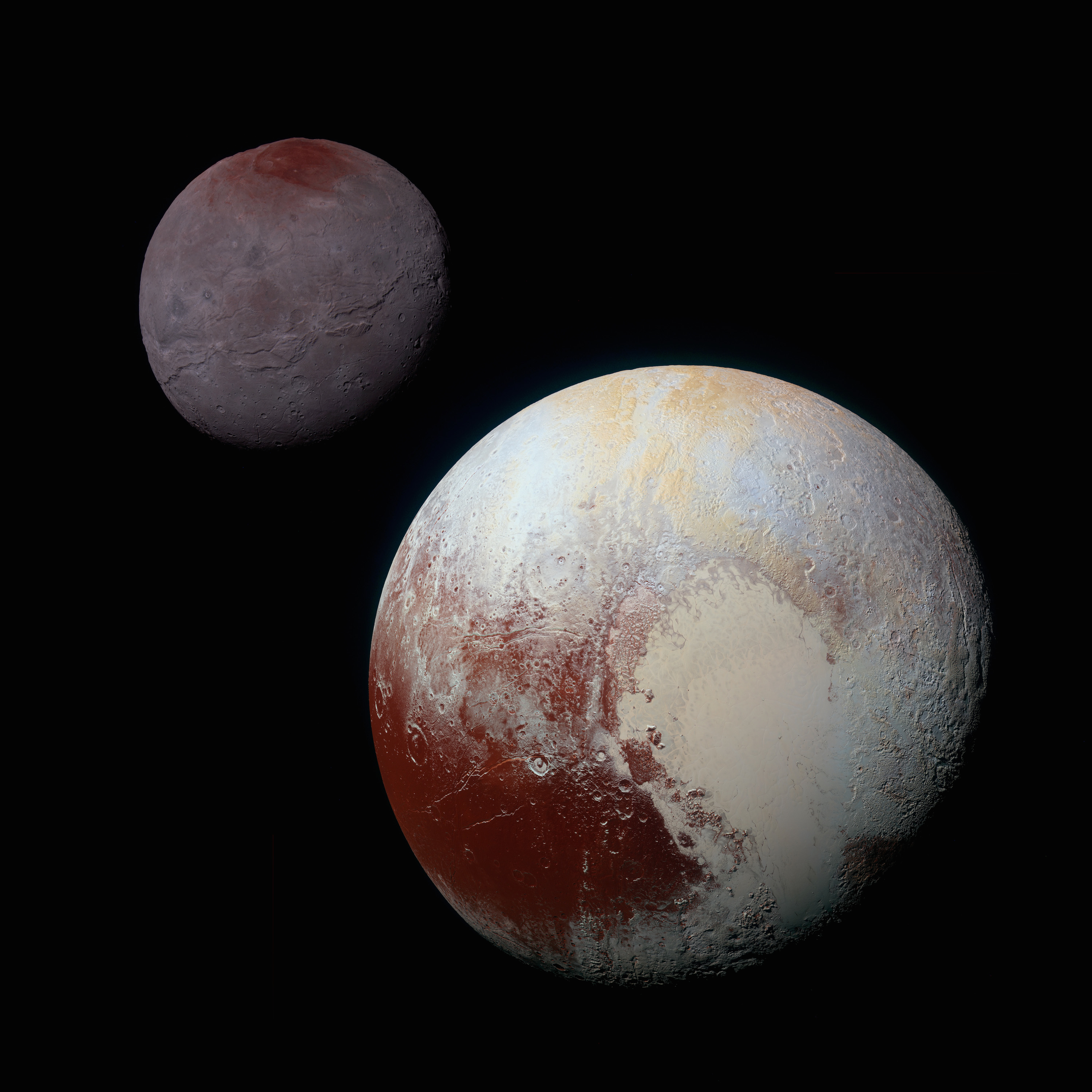 Charon (top) and Pluto are only separated by 12,000 or so miles (image credit: NASA-JHUAPL-SwRI).