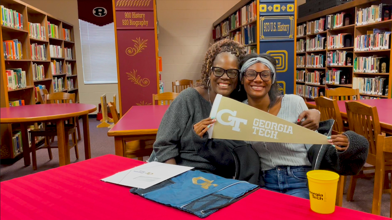 Christa May, pictured with her mother at Warner Robins High School, received early admission to Georgia Tech. (Photo by Evan Atkinson)