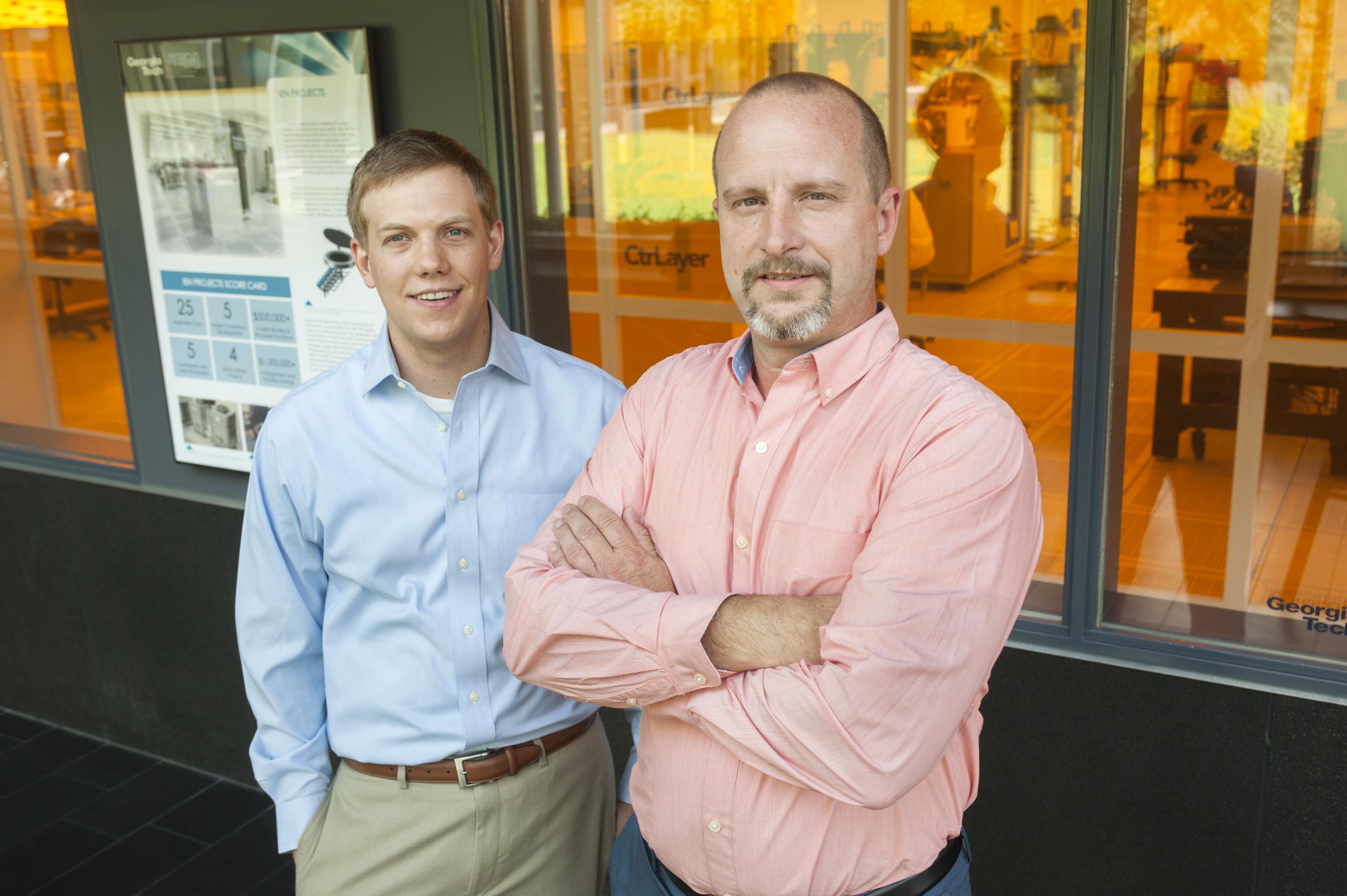 Research engineer and student Brooks Tellekamp (left) and Alan Doolittle, professor of electrical and computer engineering, stand outside the clean room at Georgia Tech's Marcus Nanotechnology Building. Credit: Georgia Tech / Christopher Moore
