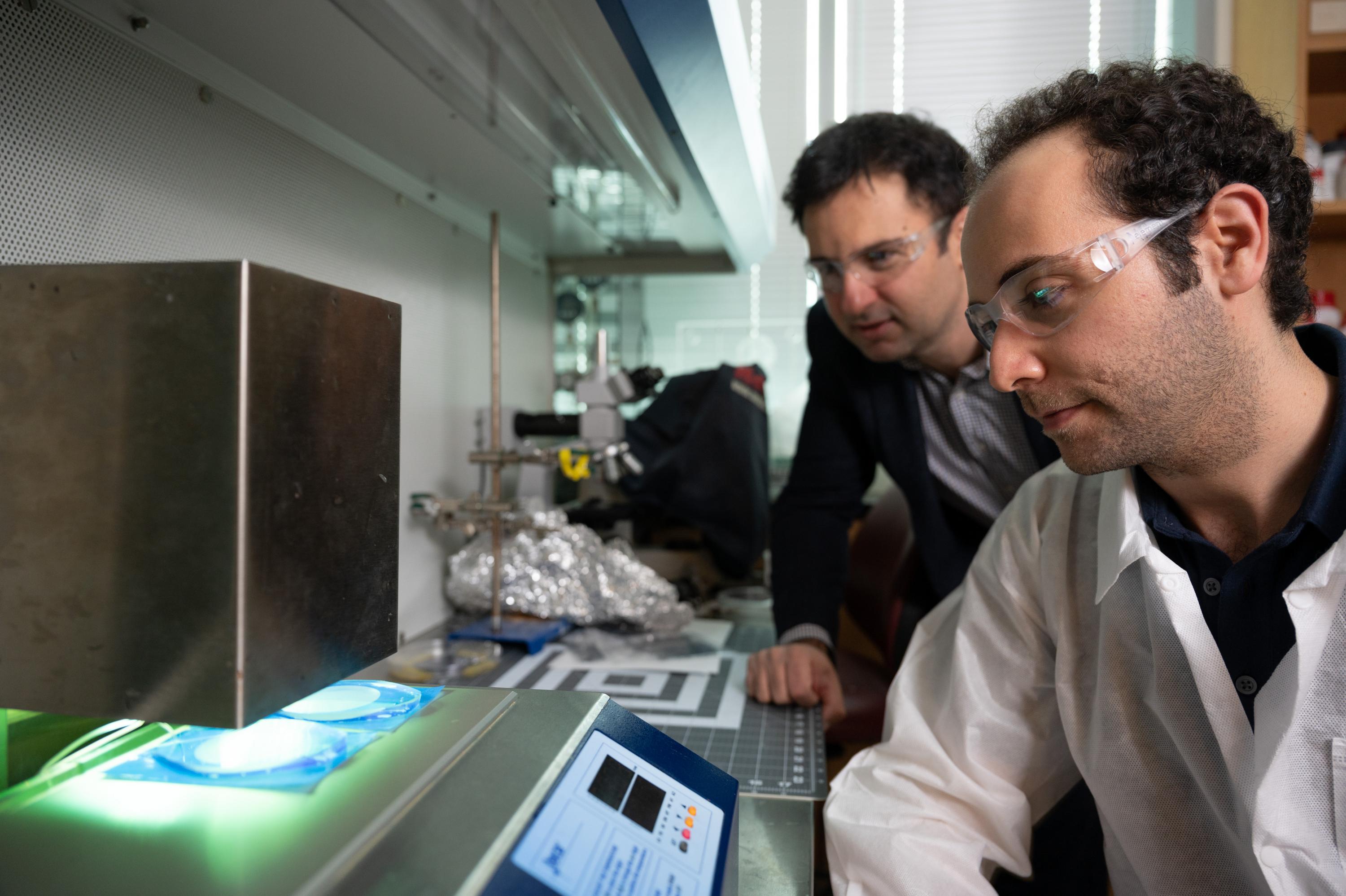  Fabrication of the microchip. The device is fabricated by injecting a polymer into a micro fabricated mold and the polymer is cured under ultraviolet light to produce low-cost, single-use devices.

 