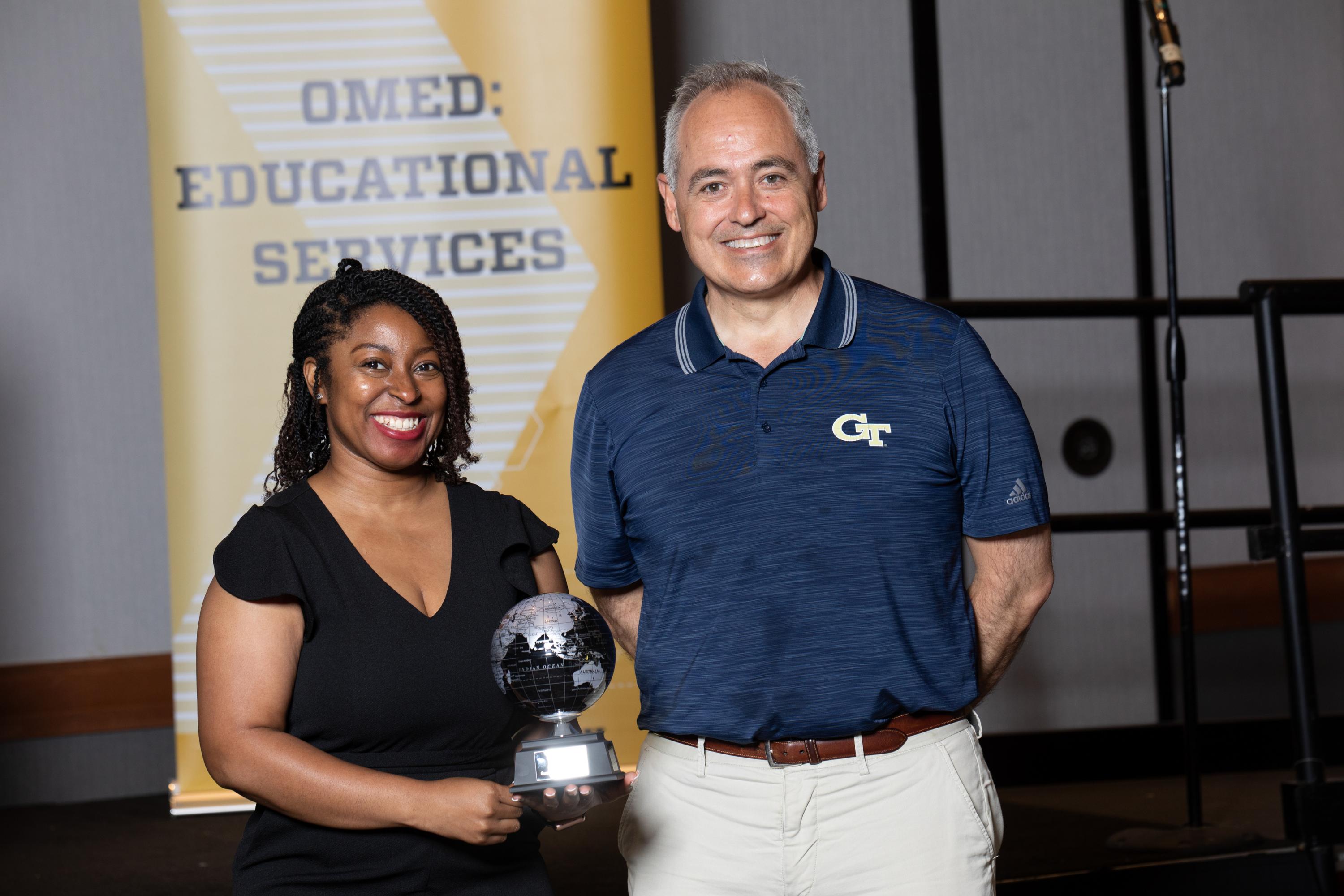 OMED Program and Operations Manager Markyta Holton poses with Georgia Tech President Ángel Cabrera at the three-week program's closing