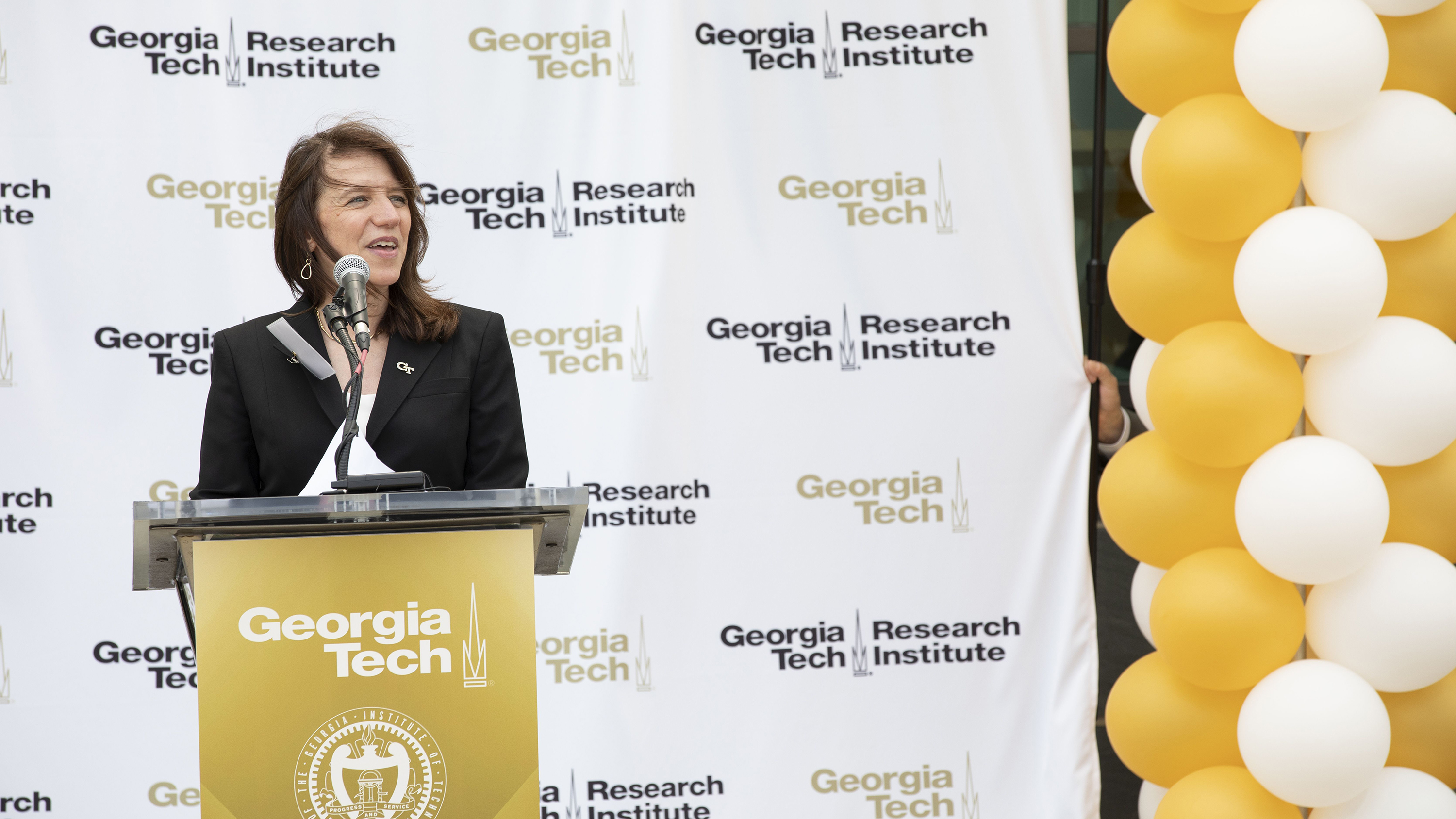 Interim Director Lora Weiss speaks at the Ribbon Cutting Ceremony for GTRI's new Cobb County Research Facility-South. Photo: Sean McNeil
