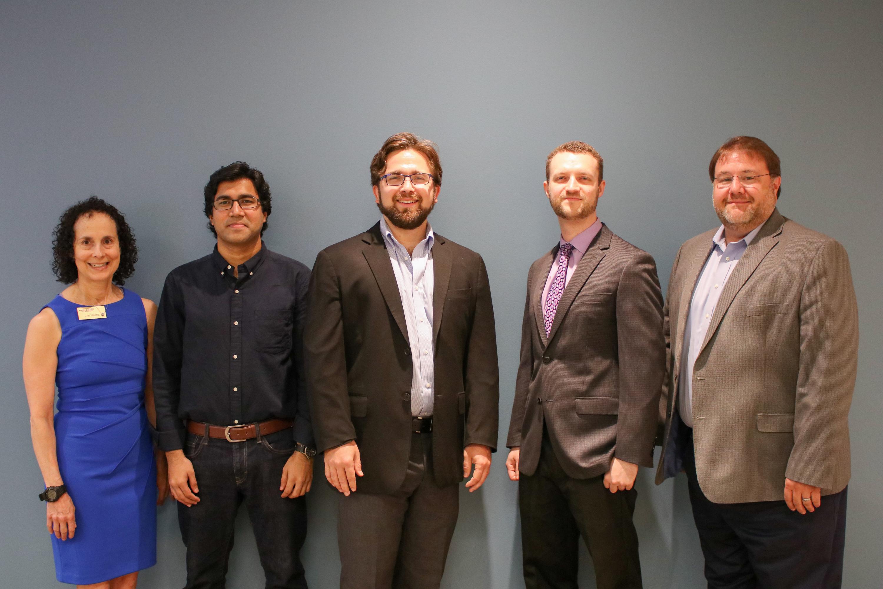 The 2019 Georgia Innovative Economic Development Internship Cohort. From left: Jan Youtie, director of the Science, Technology, and Innovation Policy program at Georgia Tech; Ebney Ayaj Rana, a master's student at Georgia State University; Karl Grindal and Daniel S. Schiff, Ph.D. candidates in Tech's School of Public Policy, and Alfie Meeks, director of Tech's Center for Enonomic Development Research. (Photo by: Matthew Hummel)