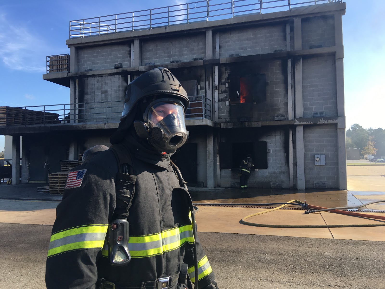 A member of the Coweta County Fire Department wears the latest version of the FireHUD device. Georgia Tech graduates started the company to protect first responders. 