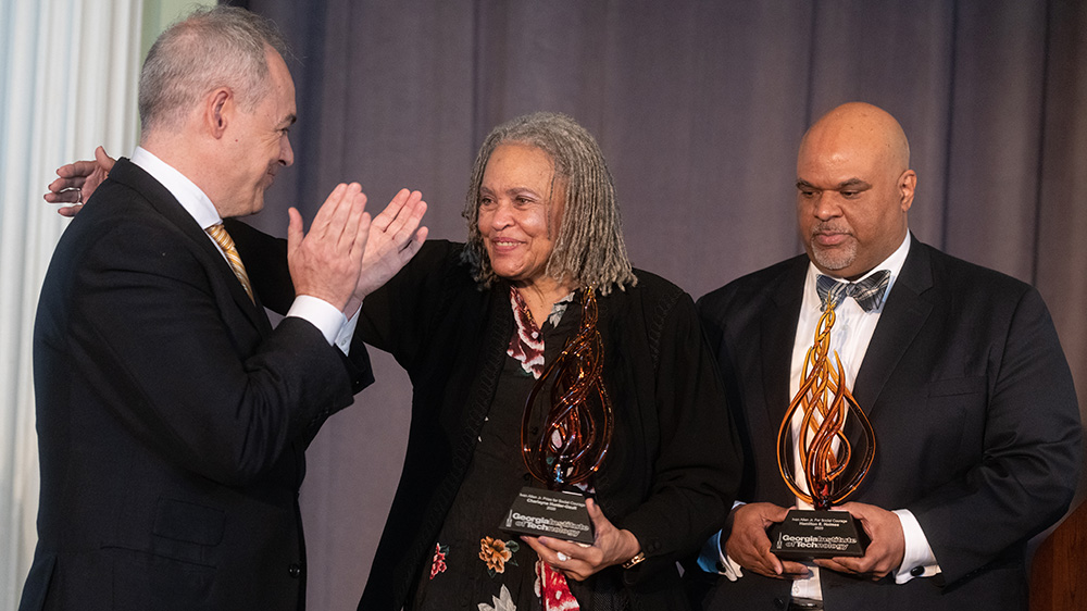 Georgia Tech President Ángel Cabrera, left, presents the 2020 Ivan Allen Jr. Prize for Social Courage to journalist Charlayne Hunter-Gault and Hamilton E. Holmes Jr., who accepted the award on behalf of his late father, Hamilton E. Holmes. (Photo: Allison Carter)